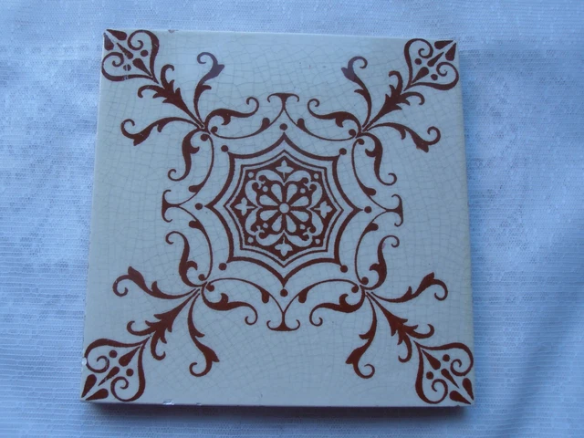 Old Victorian/Edwardian MINTONS brown geometric  patterned tile approx 6" x 6"