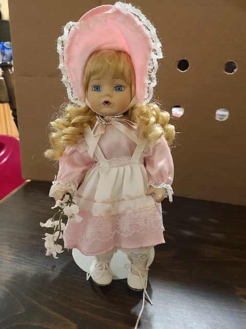 Wyndham Lane Amanda Blond blue eyed Porcelain Collectible Doll.  Pink dress