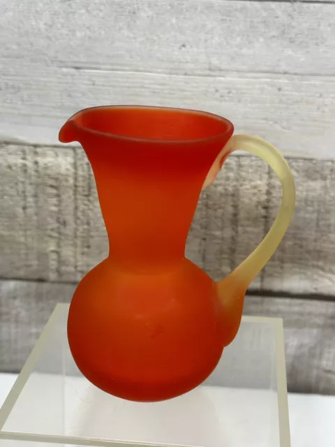 Satin Glass Pitcher By Pilgrim In Orange With Yellow Applied Handle