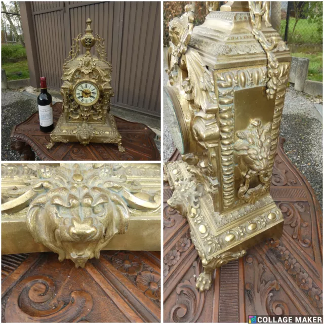 Antique bronze lion heads mantel clock