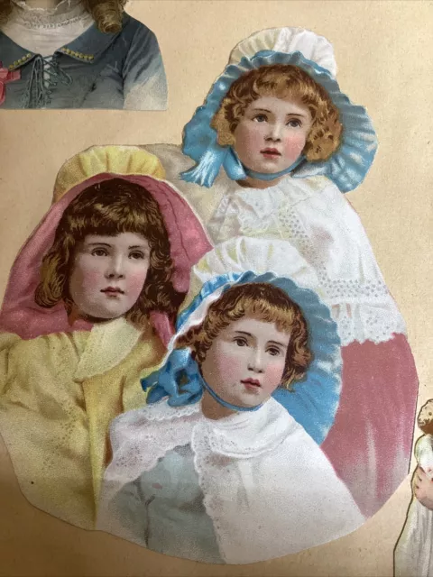 Página de libro de recortes troquelada de colección del siglo XIX con tarjetas victorianas y troquelados en ambos lados