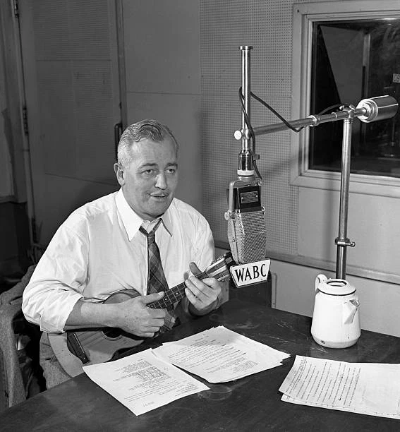 SINGER COMEDIAN AND Radio announcer Phil Cook with ukulele New Y 1940s ...