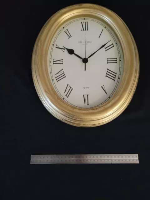clock gold leaf oval  W Middop