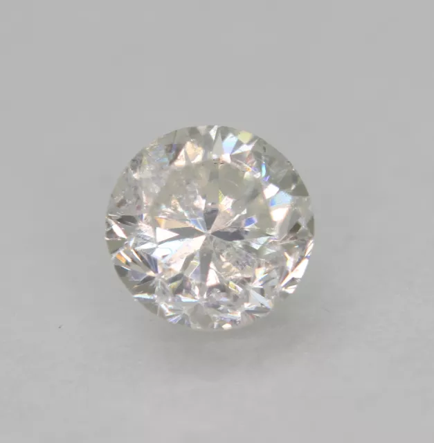 Certified 0.55 Carat F SI2 Round Brilliant Enhanced Natural Diamond 5.04mm 3VG