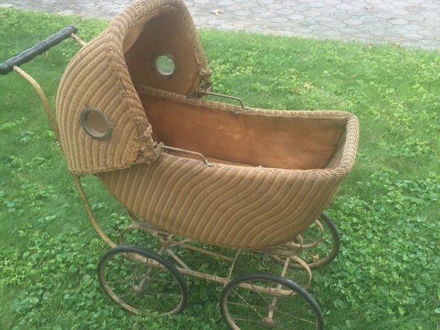 Antique Wicker Doll Carriage.