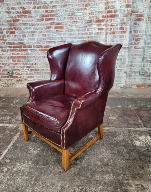 Georgian Burgundy Leather Wing back Chair