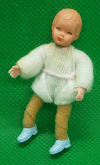 60er Jahre / 1:12:  CACO Biegepüppchen, Kind / Baby;  5,5 cm