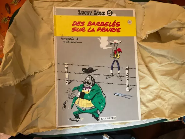 BD lucky luke tome 29 des barbelés sur la prairie dupuis