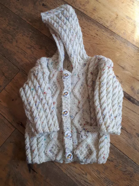 Newborn hooded jacket with pockets handknitted in candy, can be posted anywhere