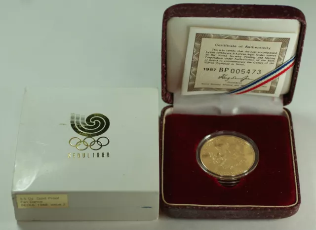 1987/1988 Seoul South Korea 25,000 Won Fan Dance 1/2 Oz Olympic Gold Proof Coin