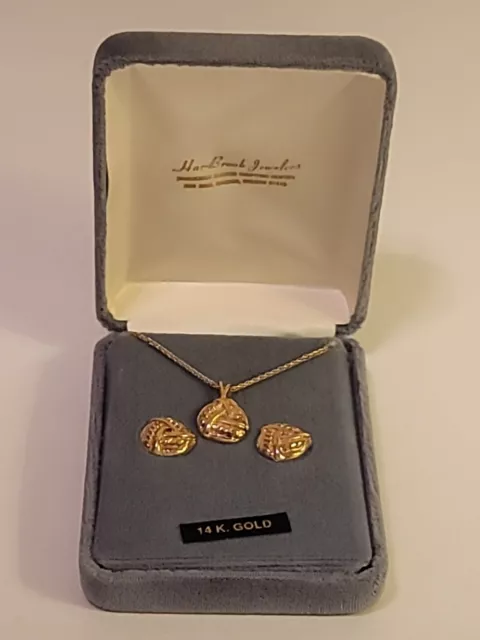 At Auction: A pair of Chanel earrings, with CC logo set with paste with a  faux pearl pendant drop, signed Chanel to the reverse with post fittings.  Total weight 6.3g.
