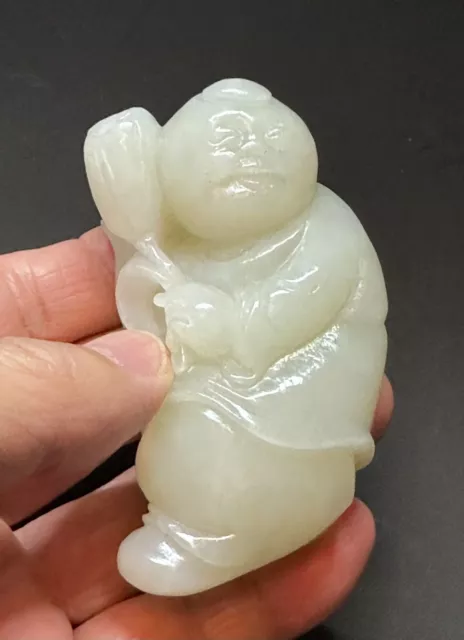 Antique Chinese carved nephrite seed jade figure of a boy