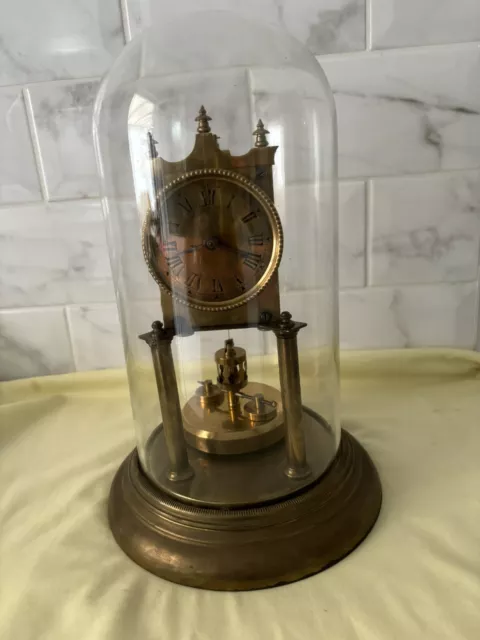 Badenia / Huber, Anniversary Clock, Glass Dome, Disc Pendulum. Restoration.