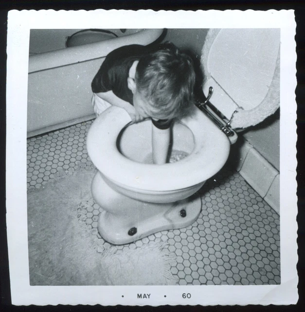 FOUND PHOTO Kid Putting Hand in Toilet snapshot vtg odd unusual weird strange