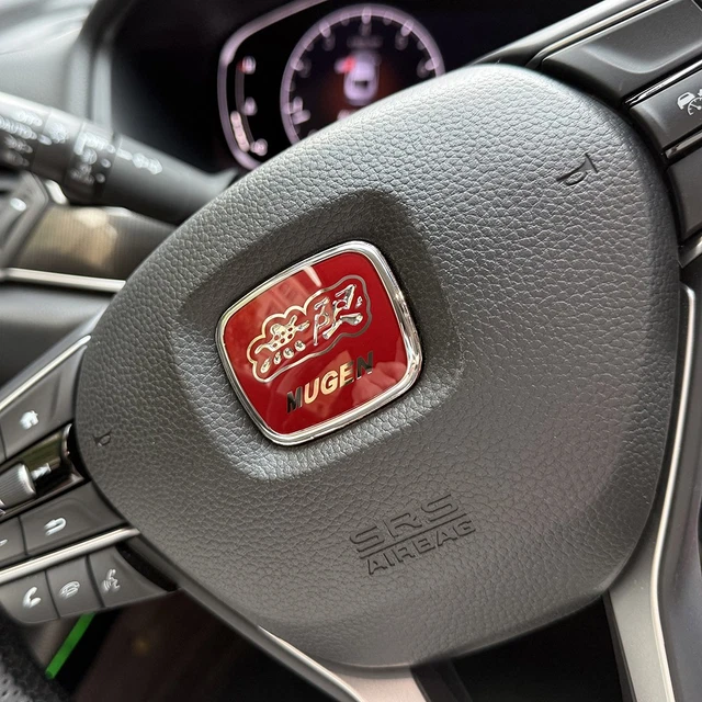 thumbnail image 2 of JDM MUGEN Red Steering Wheel Emblem For Honda Civic Accord S2000 FIT FA5 FD2 – 50x42mm Glossy Red Plastic 2 of 5