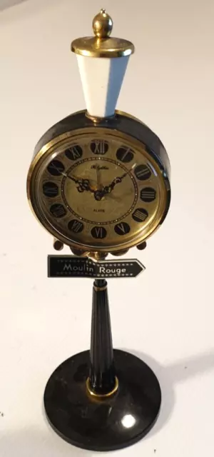 RHYTHM VINTAGE WIND-UP CLOCK WITH ALARM "MOULIN ROUGE" Made in Japan in 1970’s.