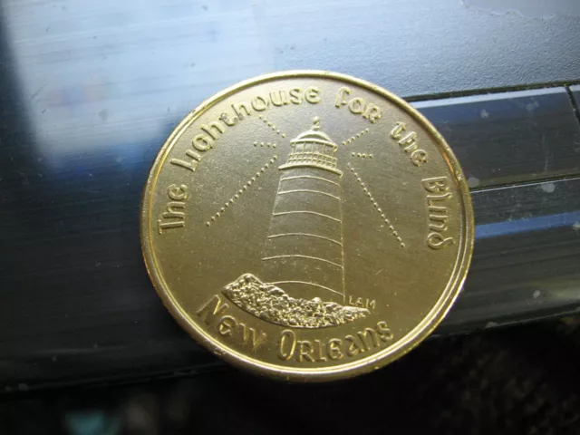 lighthouse of the blind mardi gras doubloon new orleans coin rare vintage