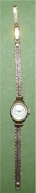 Montre HUMBERT-DROZ hd lou femme mecanique, bracelet acier doré jaune