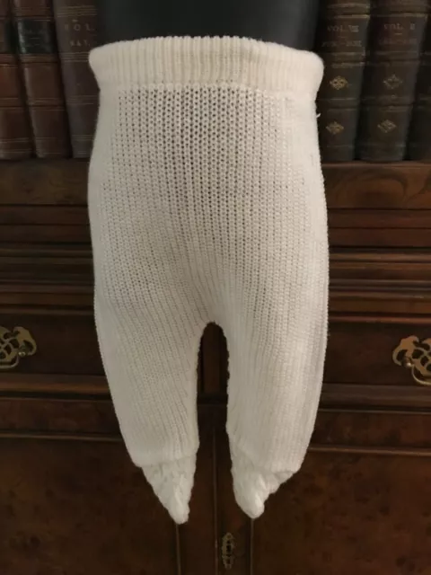 Leggings vintage in tessuto bianco lavorato a maglia bambino con piedi