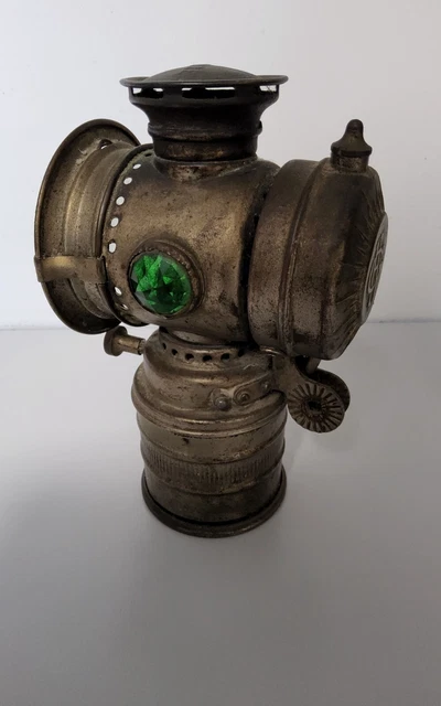 Lampe de vélo antique en carbure avec verre vert et