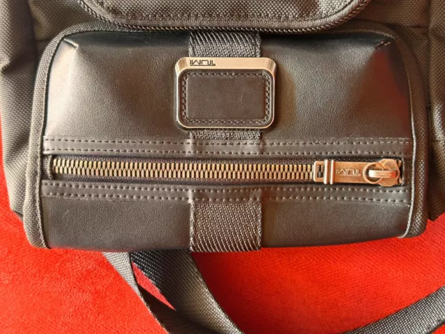 Black Tumi crossbody sling bag for men, excellent condition.