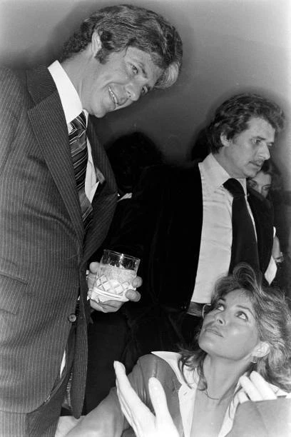 Mike Mentzer Paulette Goddard and Franco Columbu attend a scr