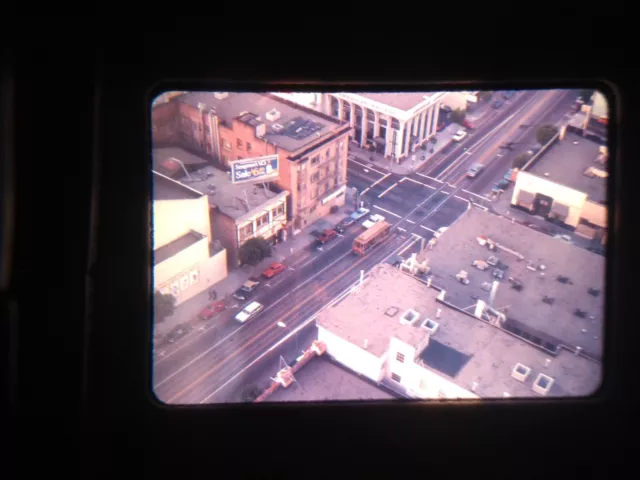 RJ15 BUS, STREETCAR, SUBWAY TROLLY 35MM slide AERIAL OF CITY STREET AUGUST 1975