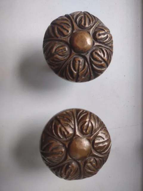 Antique ornate brass door knobs.