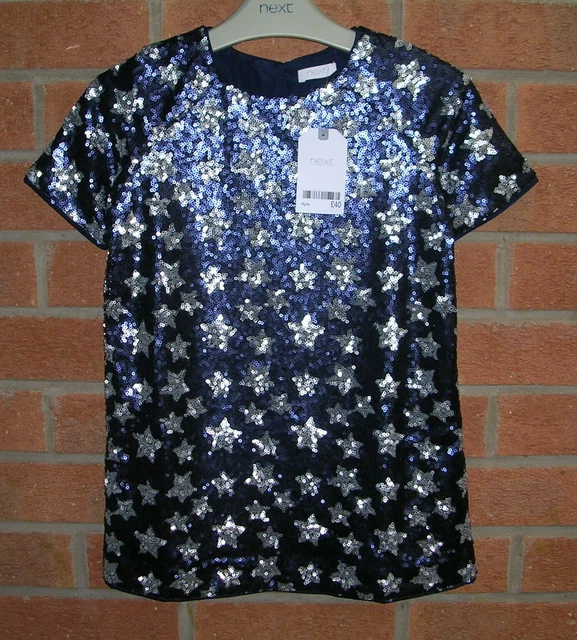 Abito nuovo con etichette NEXT Navy Paillettes Star blu scintillante età 4 NUOVO Natale prezzo disponibile £40