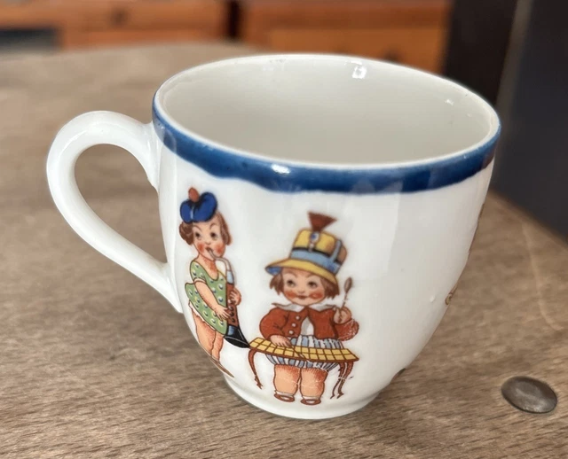 Saucière en faience signée DIGOIN SARREGUEMINES