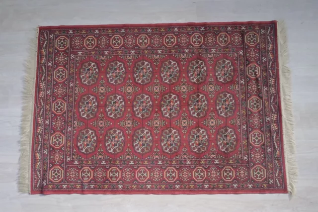 Tappetto in lana Due Palme Zenit 122 x 178 cm rosso con frange media misura