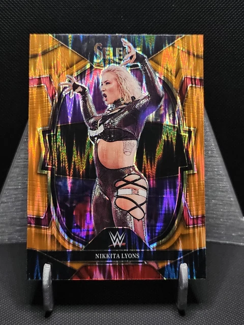 2023 Panini Select WWE Concourse Orange Flash Nikkita Lyons #75