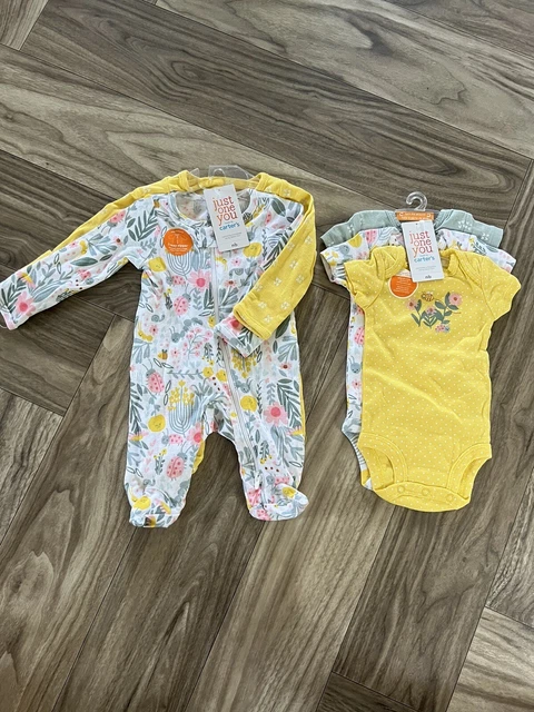 Carters Girl’s 5 pack ,3 short sleeve bodysuits And 2 zipper pajamas NB