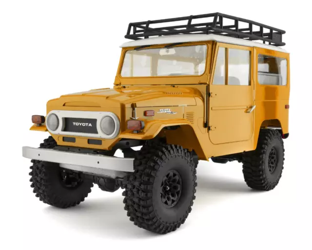 Camión de remolque eléctrico FMS 1/10 Toyota Land Cruiser FJ40 RTR (amarillo)