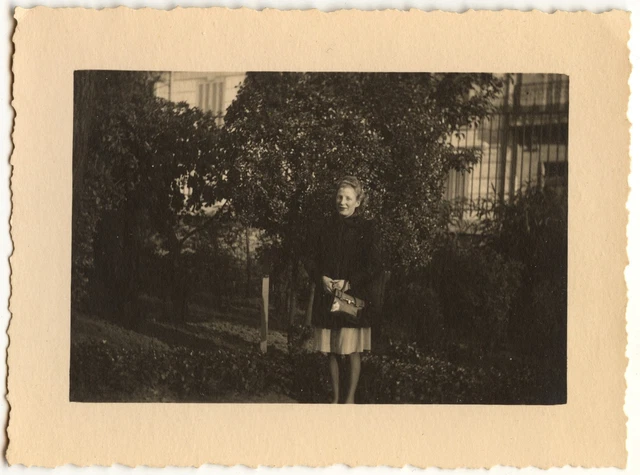 Young woman in a park - old year photo. 1930 40