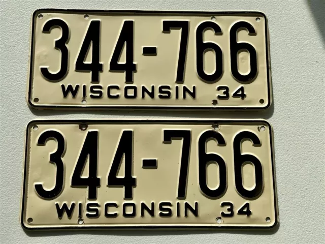 nice PAIR 1934 Wisconsin license plates -- plate # 344-766