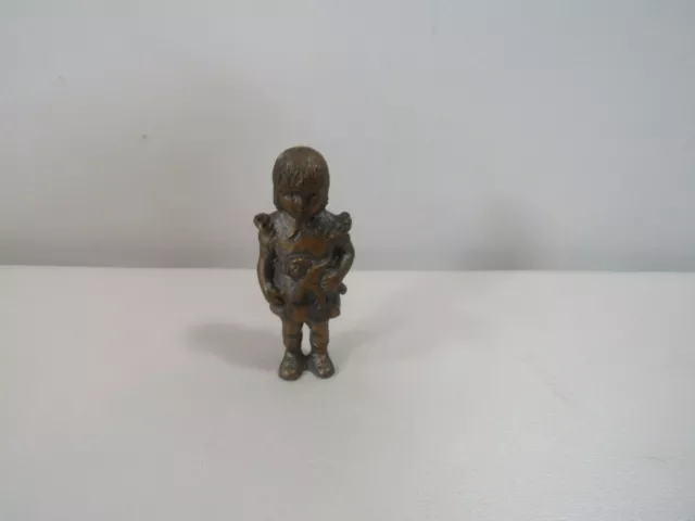 JB Jennings Bros. 2 1/4"h Metal Little Girl holding her Doll