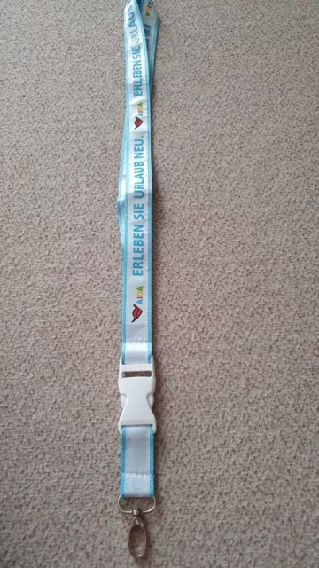 AIDA Cruises Lanyard, Schlüsselband "Erleben Sie Urlaub neu" hellblau