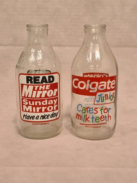 Two Vintage Advertising Glass Milk Bottles