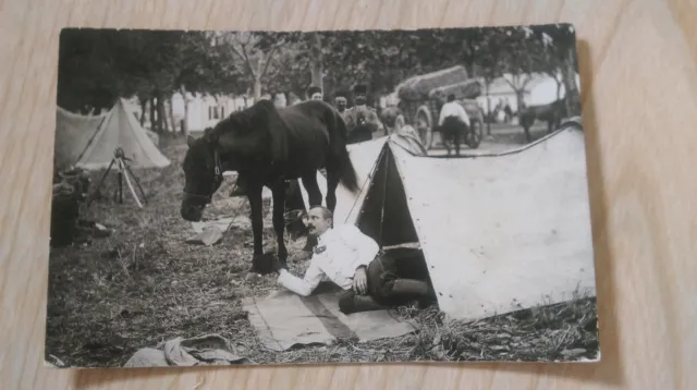 cpa carte  photo . campement militaire ..cheval .chariot .. tente