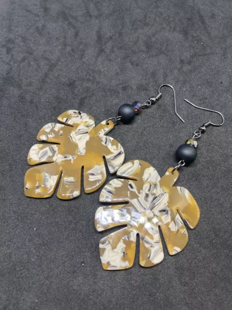 Swarovski monstera earrings deals