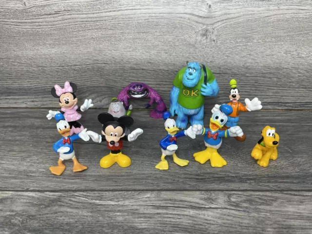 Lot of Asst Monsters Inc & Disney Mickey Mouse Minnie Donald Pluto vinyl figures