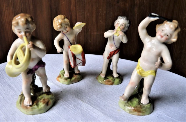 Lot de 4 enfants/Putti musiciens figurines anciennes en porcelaine allemande ??