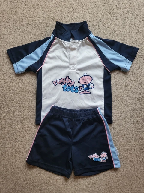 Uniforme Ruggy Tots età 2-3
