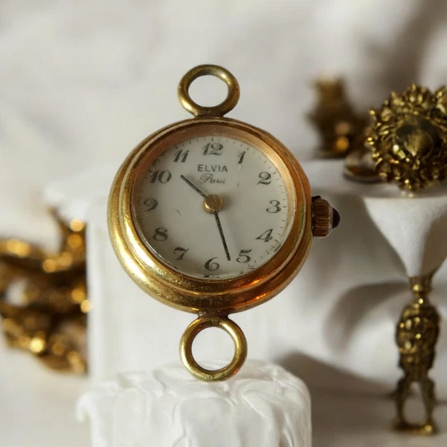 Montre Gousset Ancienne Elvia - Boîtier Doré Mécanique Manuel - Cadran émaillé Chiffres Romains