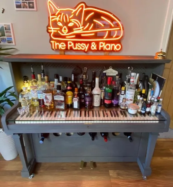 Piano clearance liquor cabinet