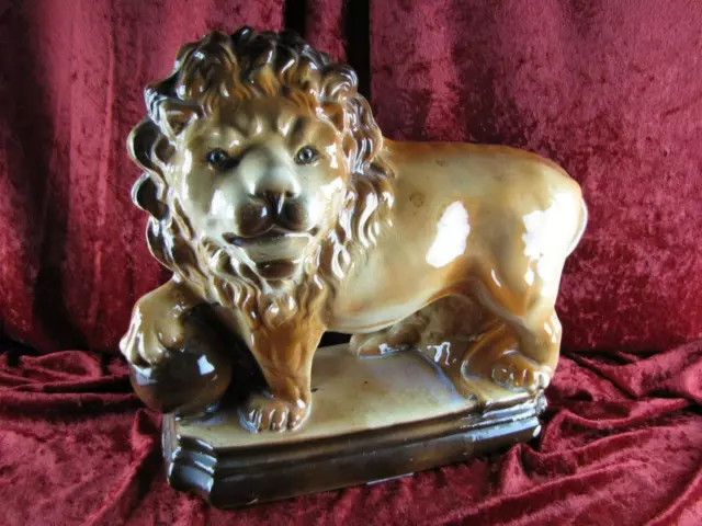 Vint Porcelain Ceramic Figure Brown Lion Paw on Ball Glass Eye- made to look old