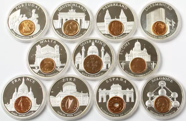 Konvolut 11 Medaillen Euro Währungen Münzen vergoldet in versilberten Medaillen