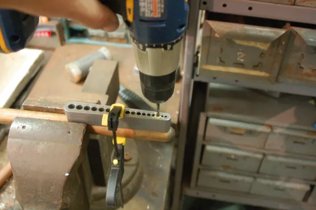 17 hole drill guide - comparable to a portable drill press -no bushings required