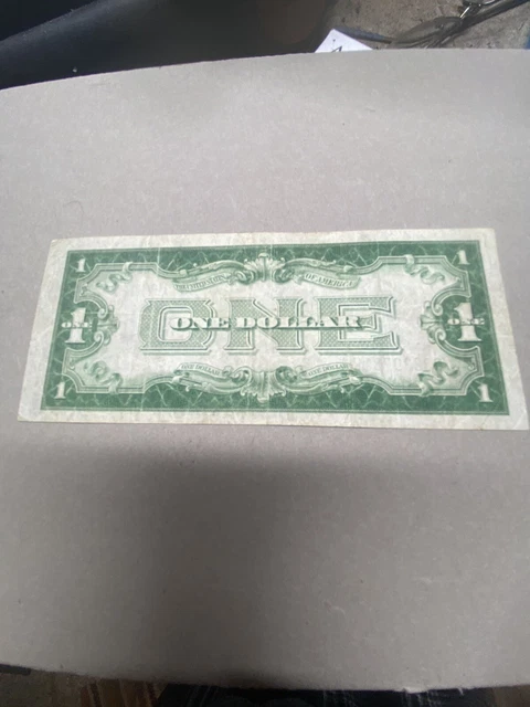 1934 One Dollar Silver Certificate with Blue Seal - FUNNY BACK 2